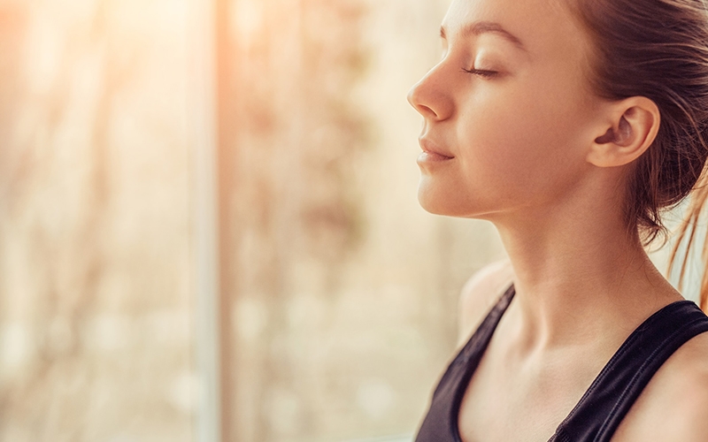 A woman holding her breath